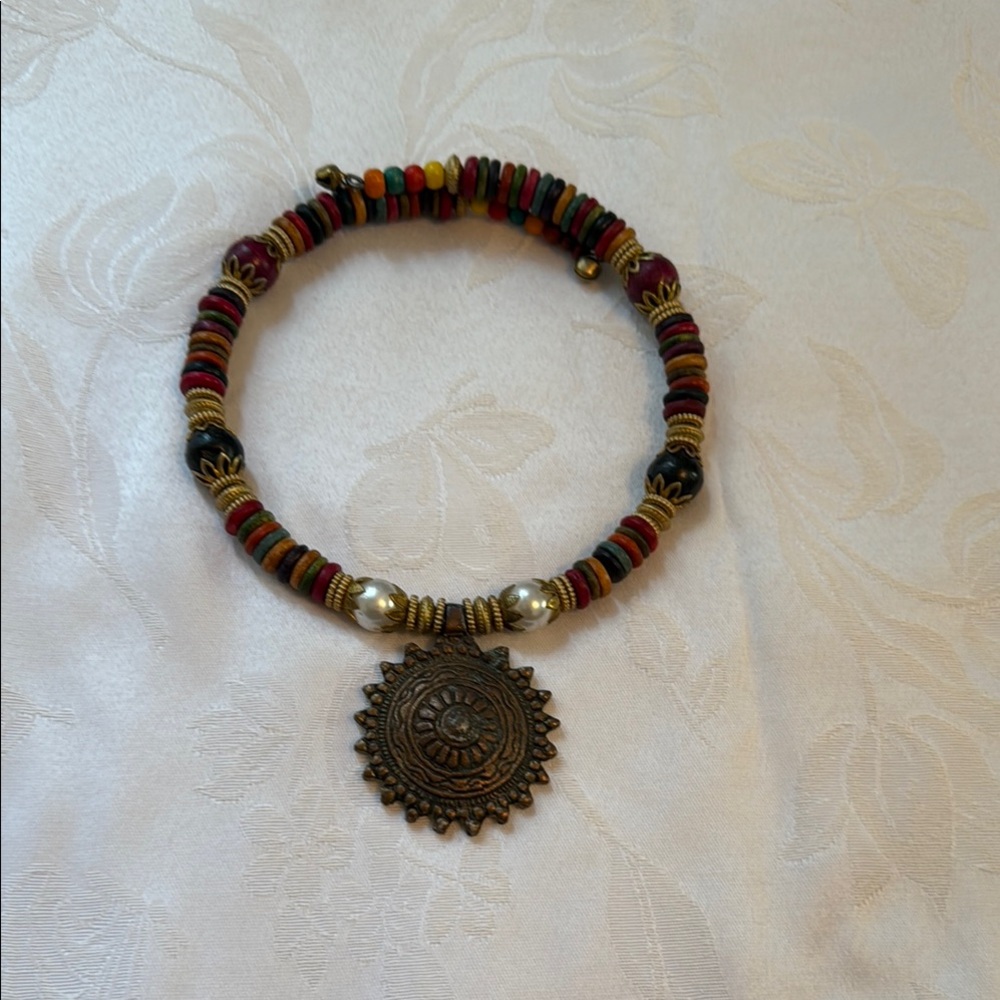 Earthy Toned Beaded Necklace with Starburst Pendant